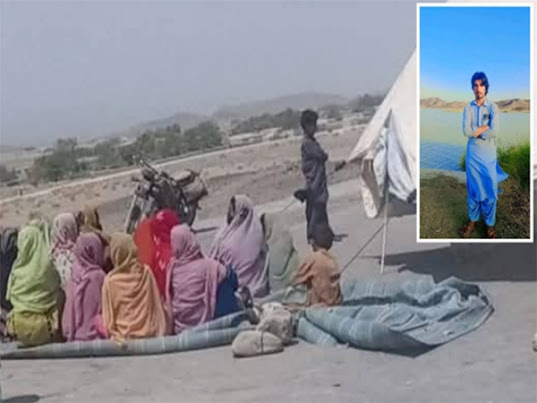 Protesters blocking CPEC highway with banners in Turbat, Balochistan