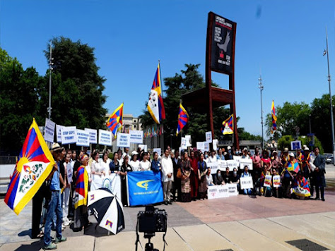 Protesters holding Tibetan flags outside the UN building in Geneva