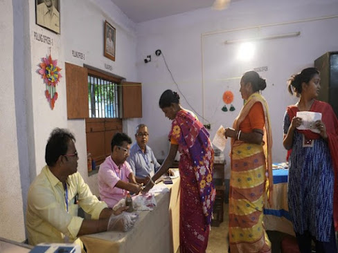 Assembly by -election at Kaliganj booth standing in voter line in 2025